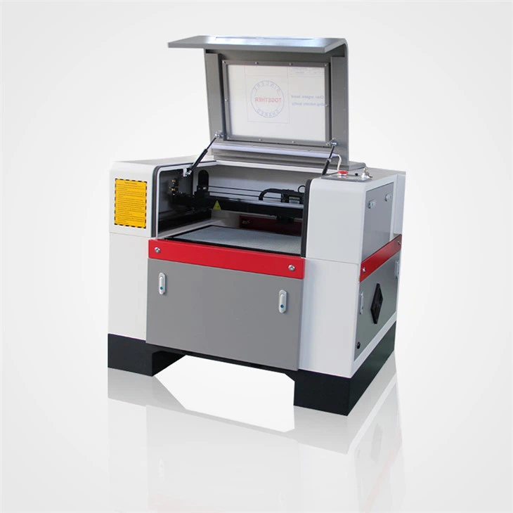 CNC CO2 laser cutting machine with sealed CO2 laser tube CE/FDA certificate